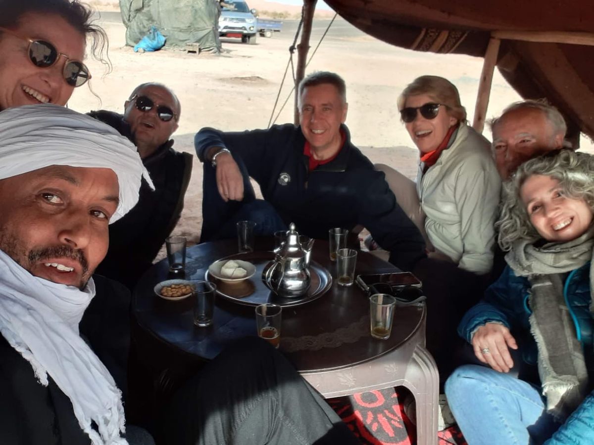 Mint tea with travelers in a nomad tent