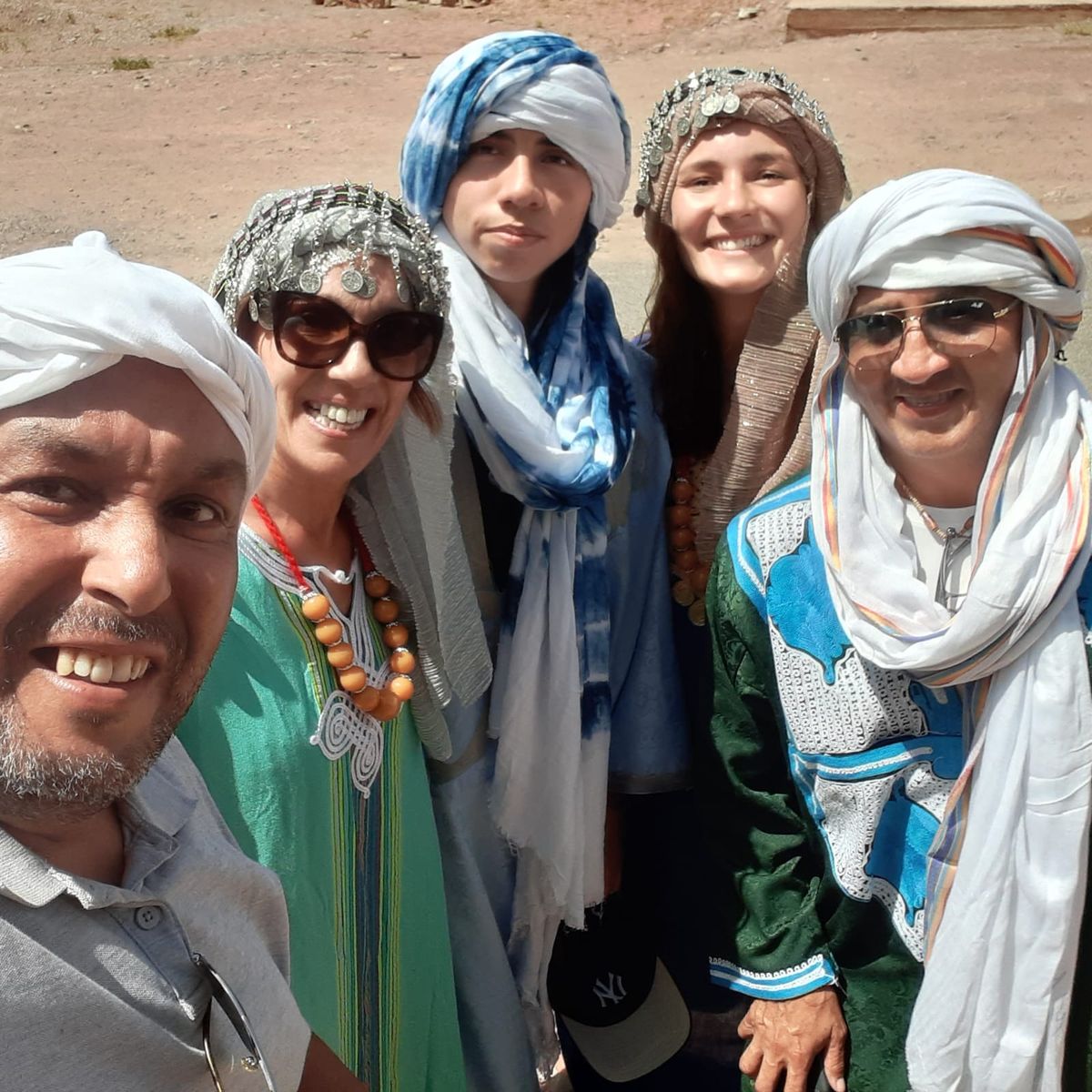 Travelers dressed in traditional Moroccan clothing