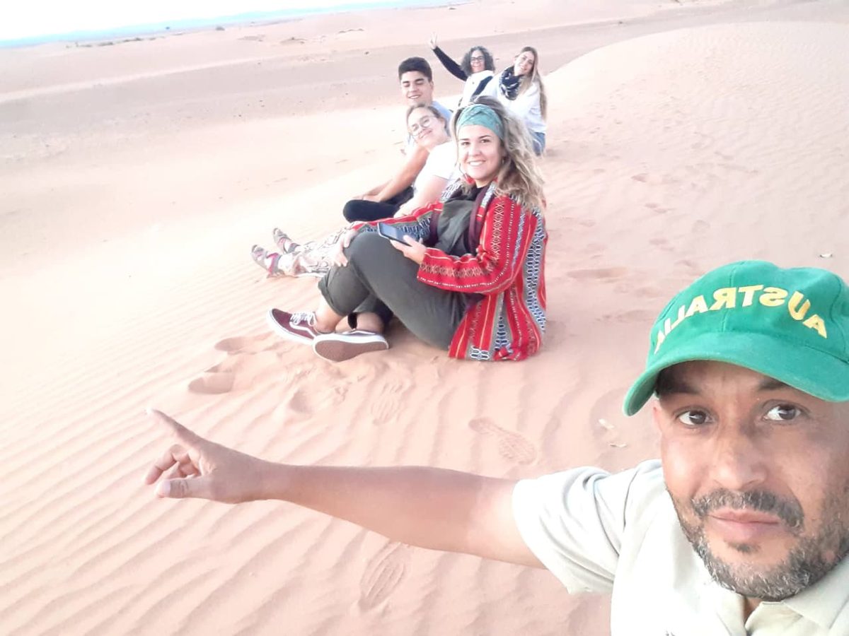 Our travelers on the Erg Chebbi dunes at sunset, Merzouga